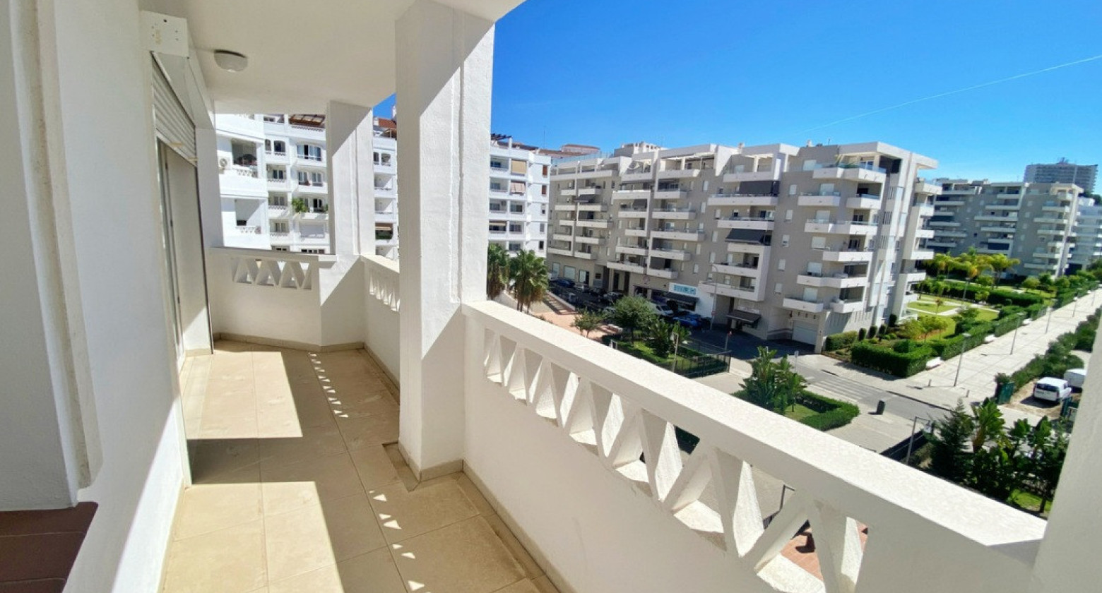 Spacious 4-Bedroom Apartment with Terraces and Parking Space